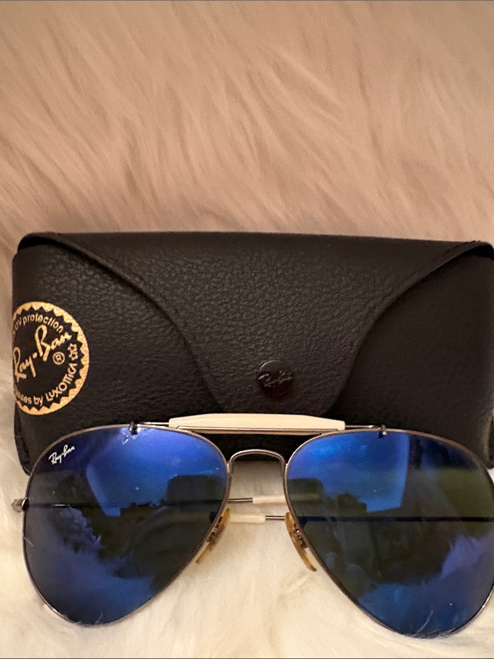Ray-Ban women’s Aviator Sunglasses with Blue Mirrored Lenses